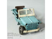 Old metal sheet metal toy jeep model