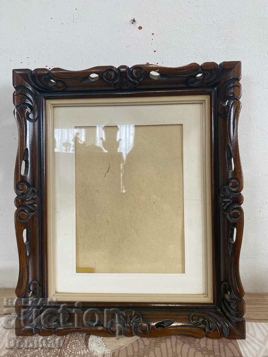 Beautiful wooden frame with beautiful hand-made carving