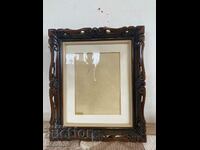 Beautiful wooden frame with beautiful hand-made carving