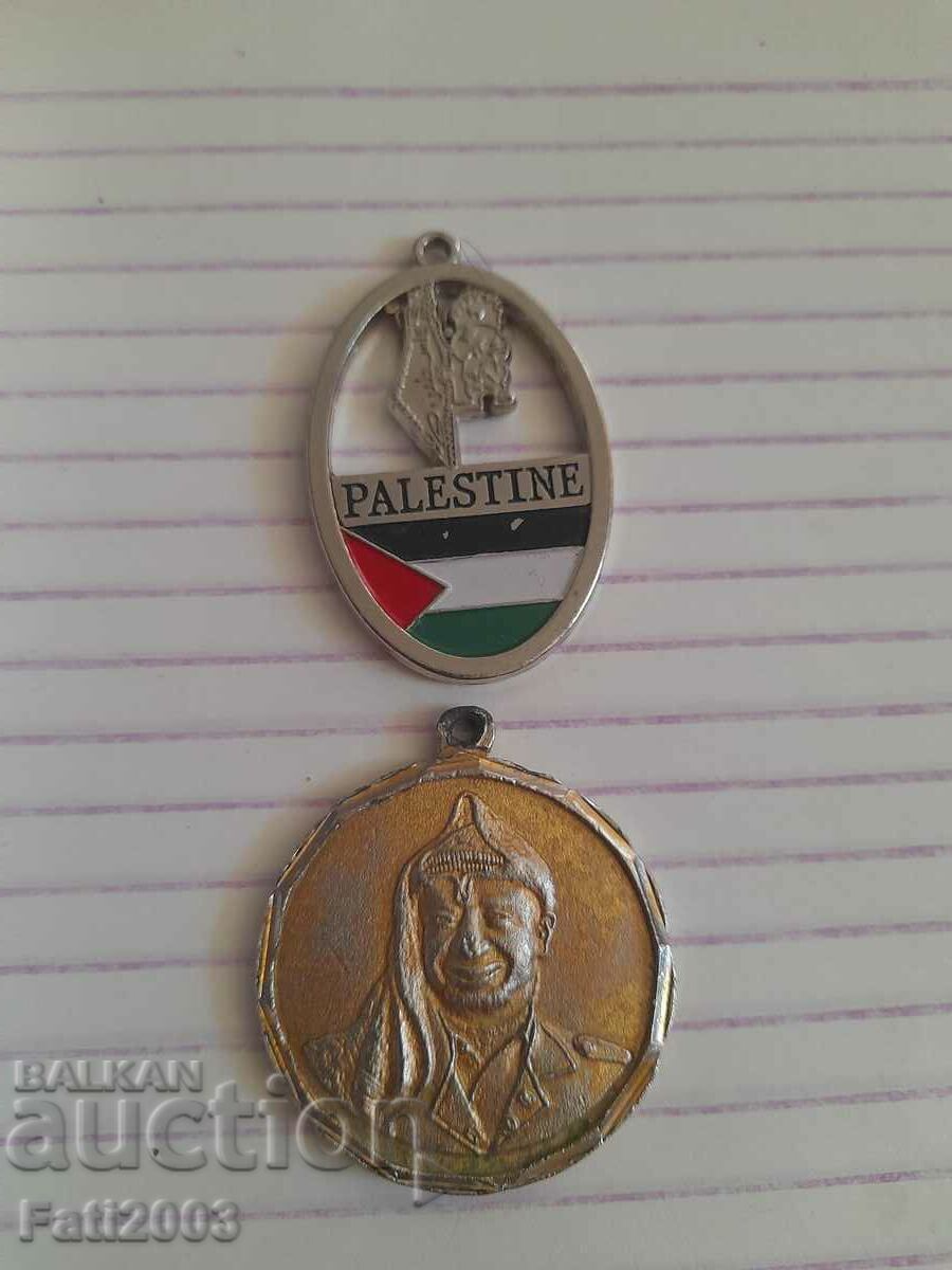 Yasser Arafat plaque and Palestine flag