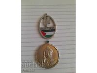 Yasser Arafat plaque and Palestine flag