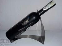 BOTTLE HOLDER. STAINLESS STEEL