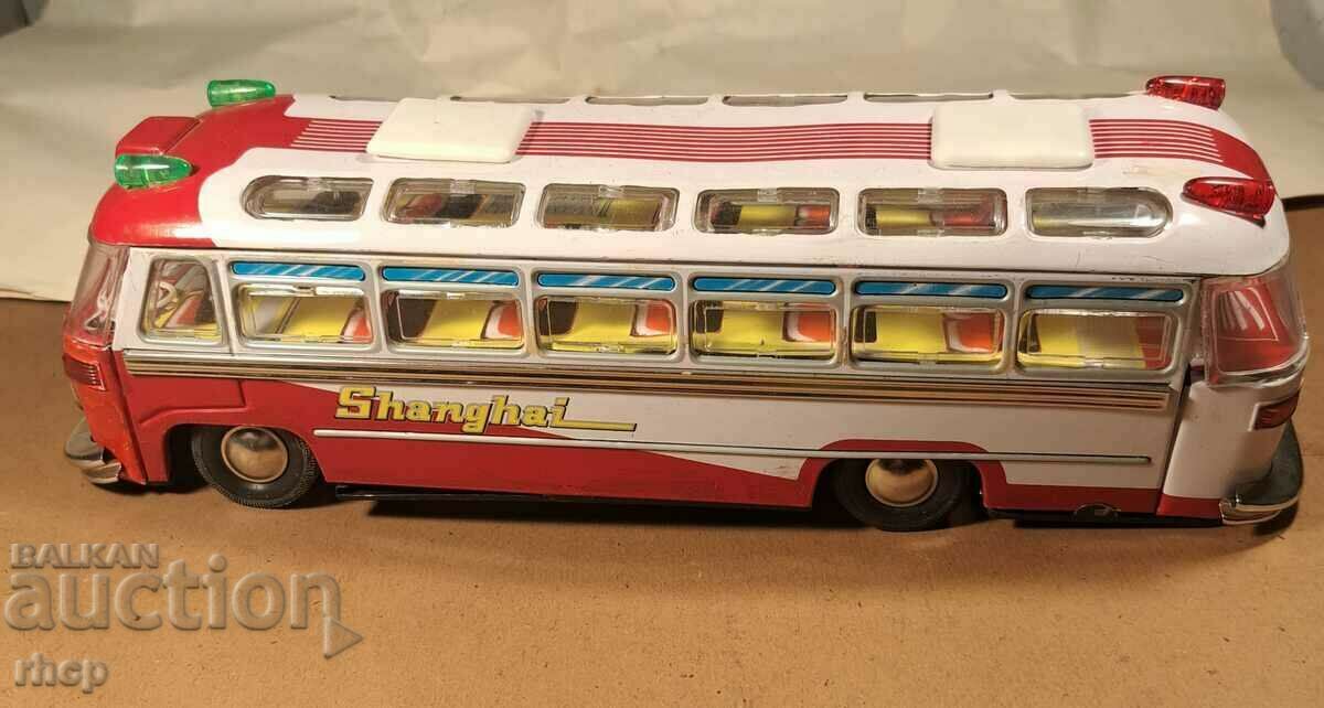 Big old tin toy bus