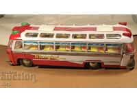 Big old tin toy bus