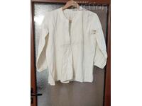 Old men's fringed shirt handmade in antiquity