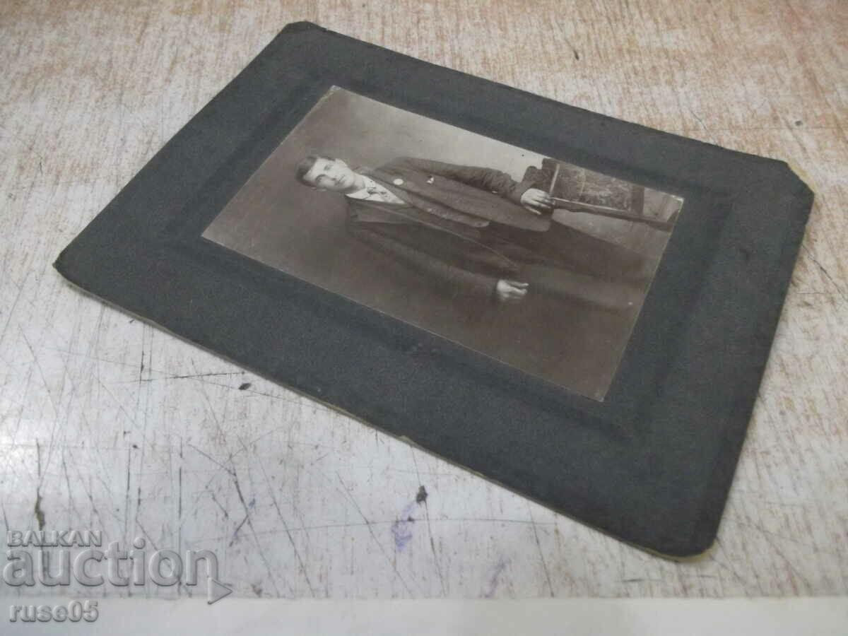 Auction Old photo of a young gentleman in a cardboard suit Auction Old photo of a young gentleman in a cardboard suit