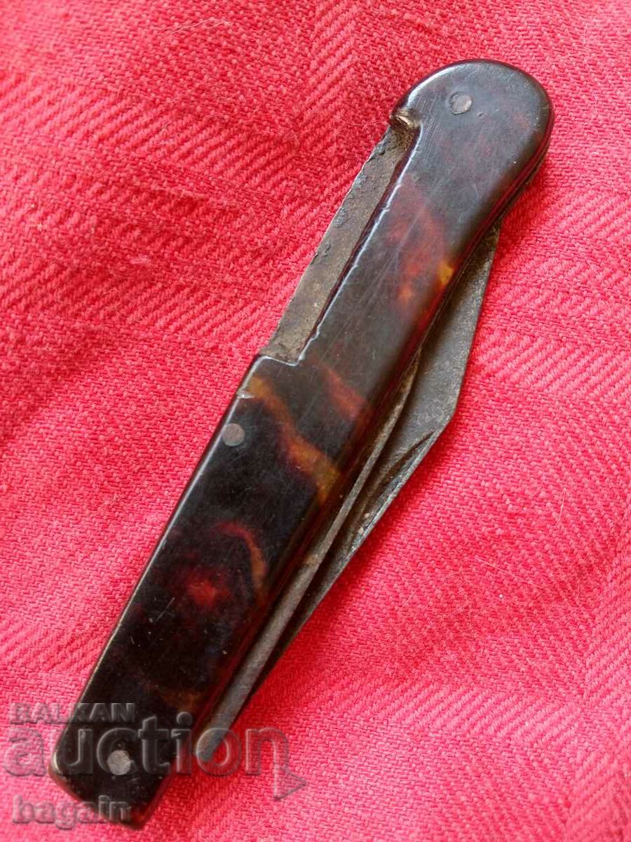 Tortoise shell knife.