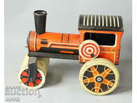 Old metal mechanical toy roller model