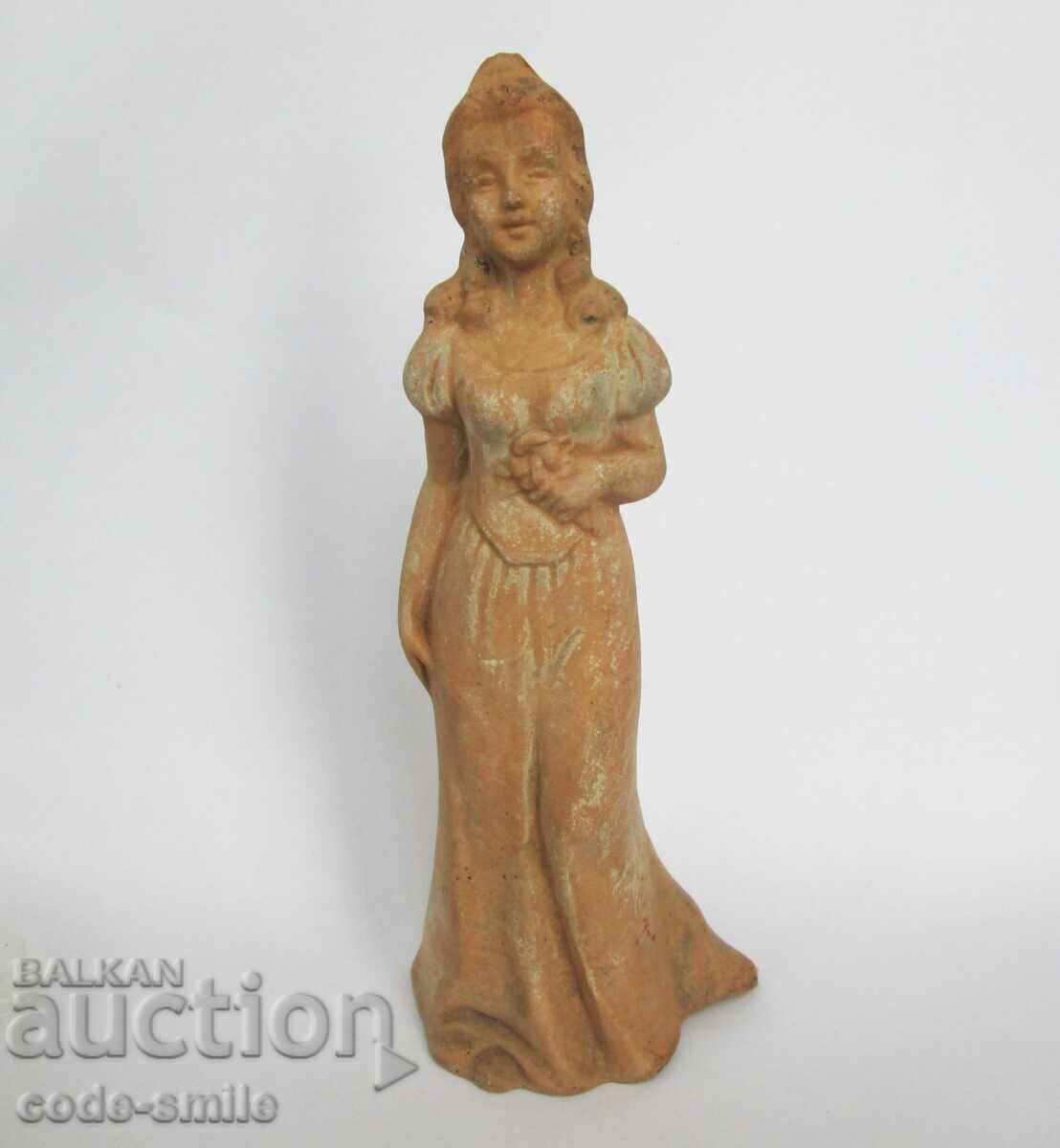 Old ceramic statuette figure of a young lady