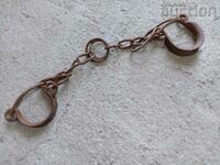 Old hand-forged buckles, chains, shackles, shackles