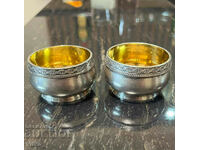 Silver salt shakers with gilding