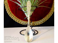 Silver-plated spoon, embossed flowers.