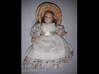 A DOLL. COLLECTION. PORCELAIN