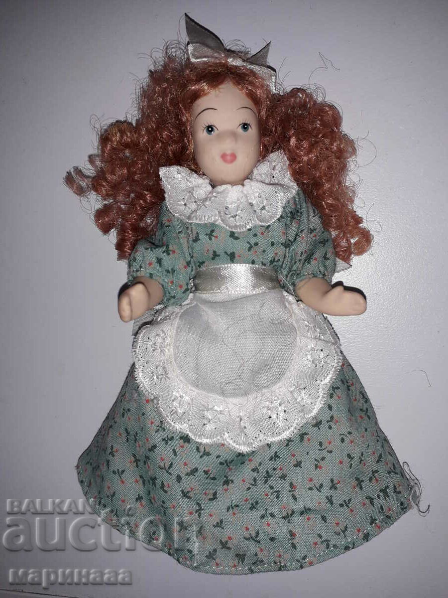 A DOLL. COLLECTION. PORCELAIN