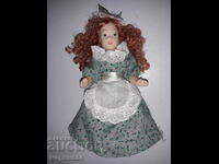 A DOLL. COLLECTION. PORCELAIN