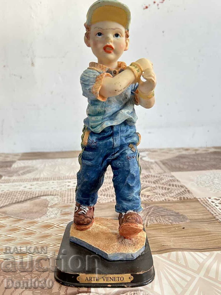 Figure statuette with a marking made of a special type of plastic