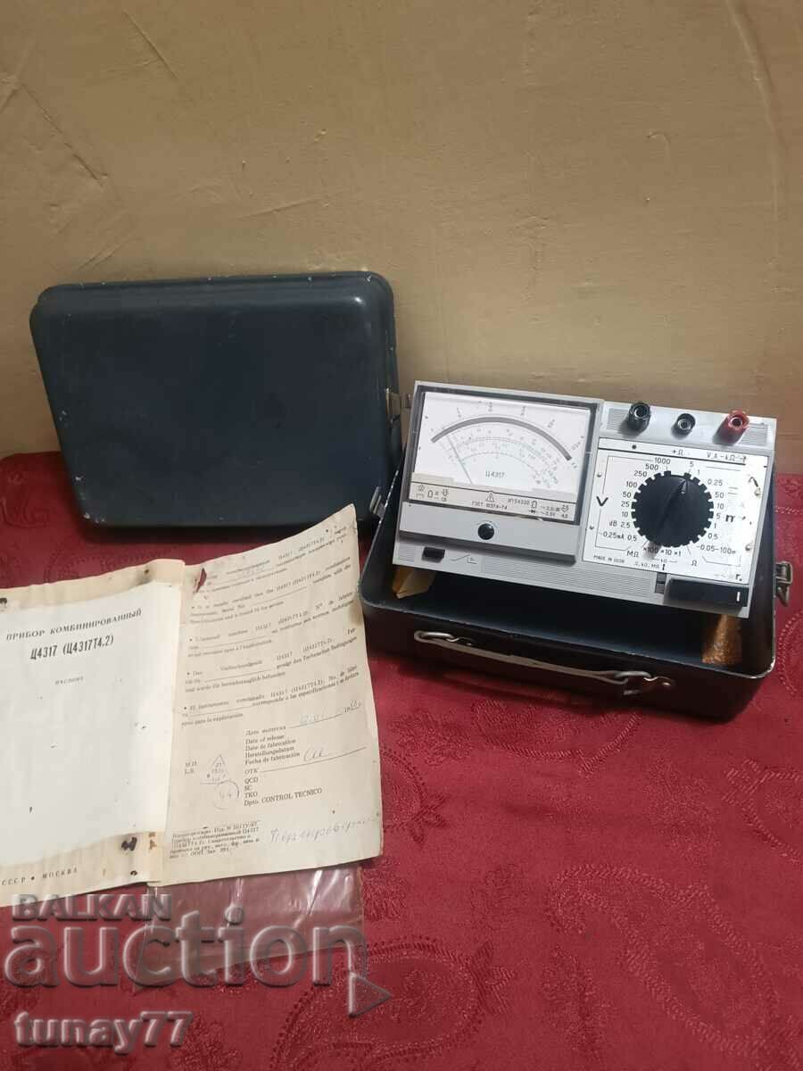 Old meter in metal box and documents