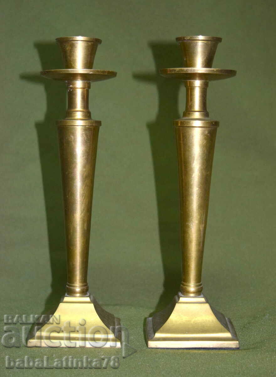 Set of two old brass candlesticks