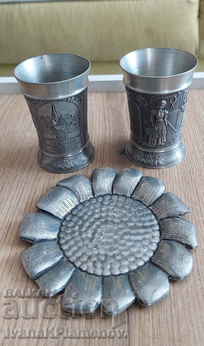 Metal cups and panels