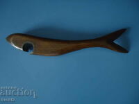 Retro old wooden fish opener