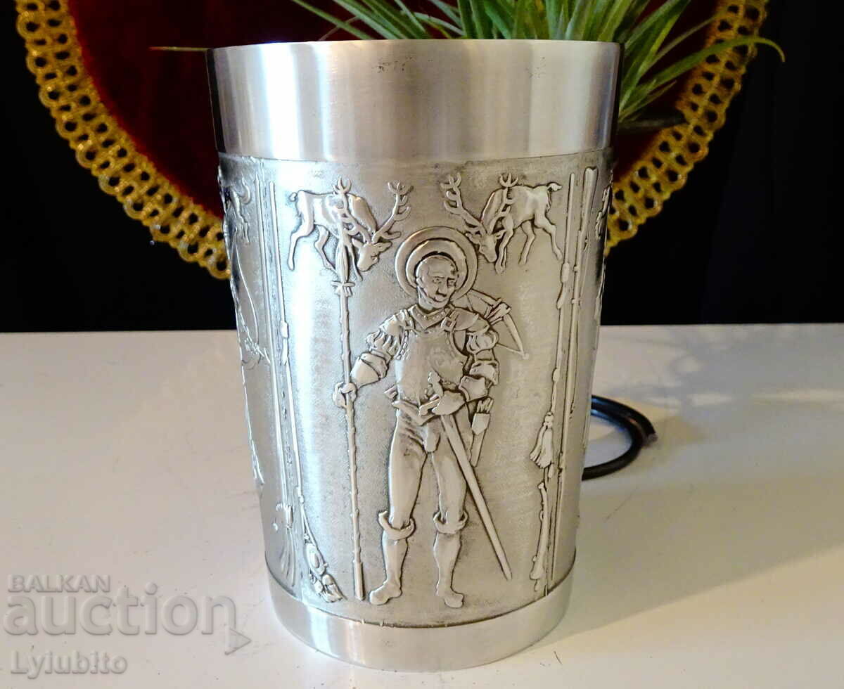 Delivery of Cup, tin mug with unique hunting pictures. Delivery of Cup, tin mug with unique hunting pictures.