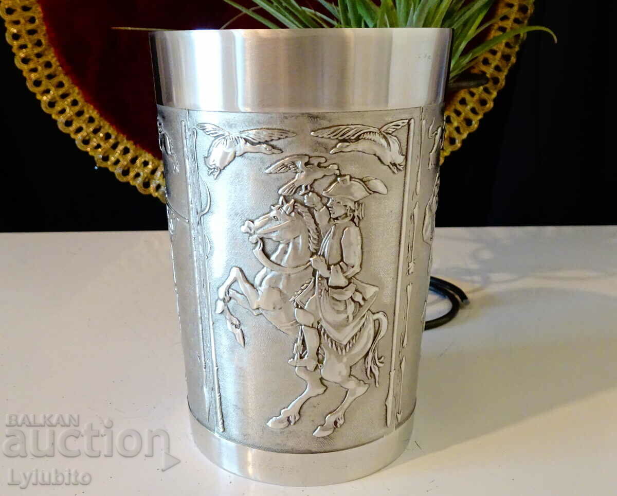 Cup, tin mug with unique hunting pictures. Cup, tin mug with unique hunting pictures.