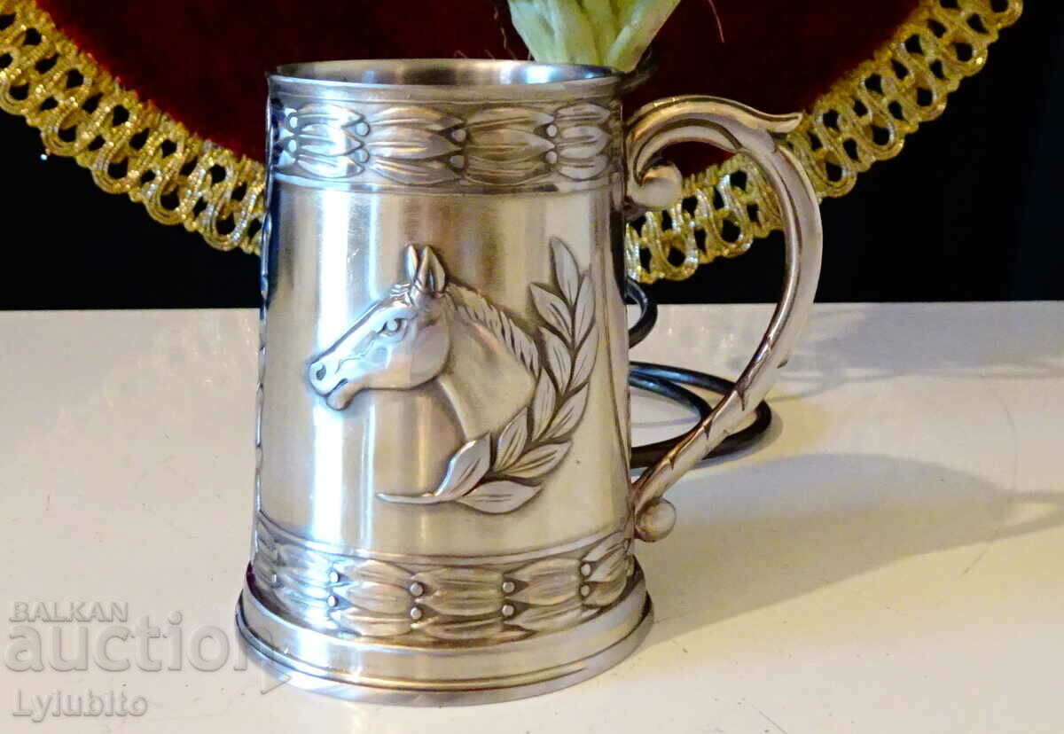 Silver-plated cup, horse, laurel wreath.