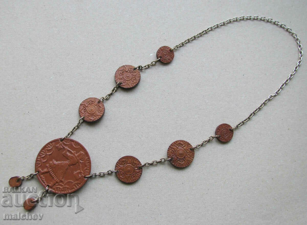 Old ethnic jewelry - leather and chain necklace, preserved