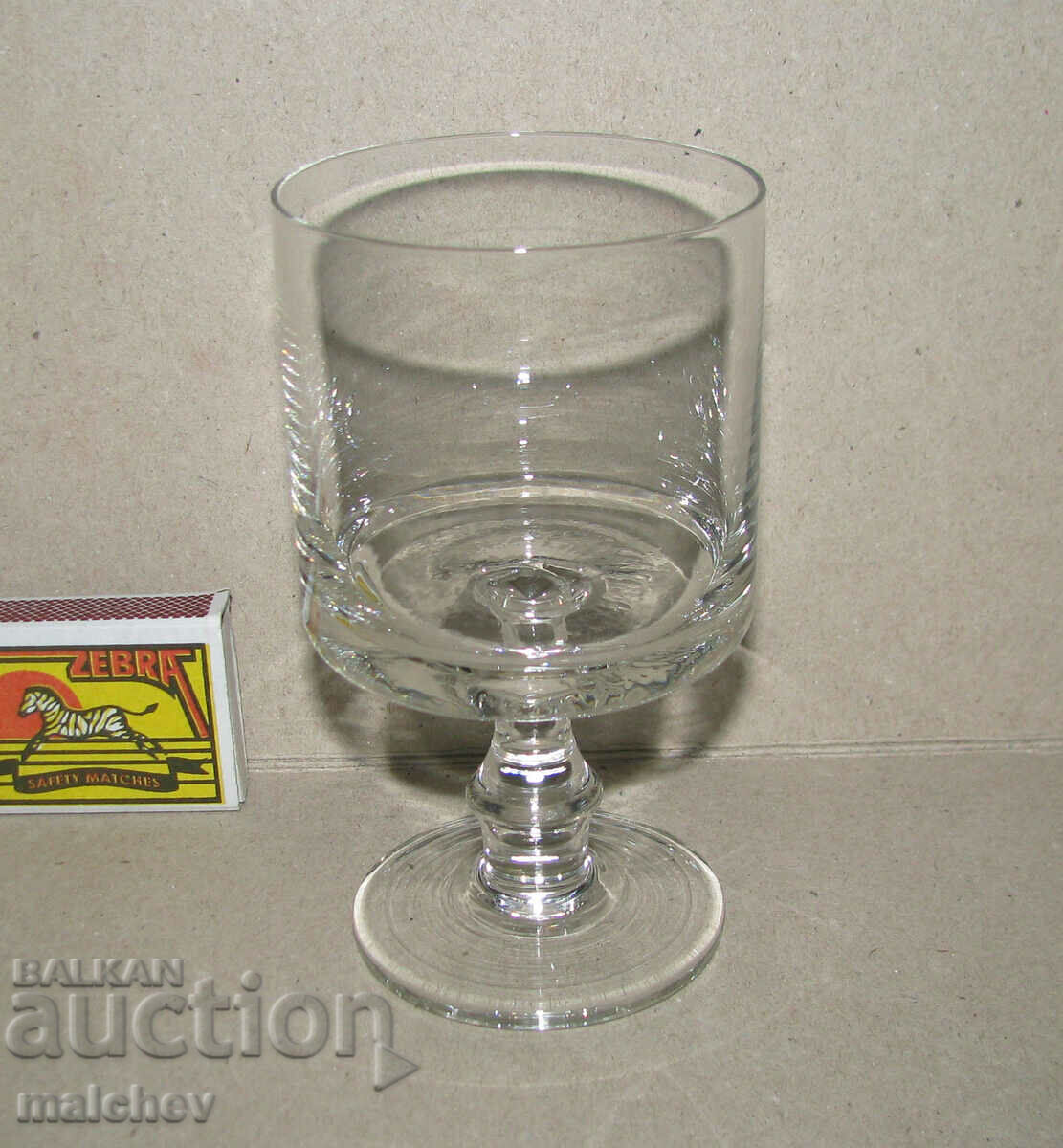 Old glass cup on a stool 12 cm for tea light candle holder