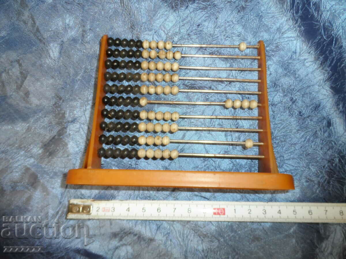 Auction an old children's abacus Auction an old children's abacus