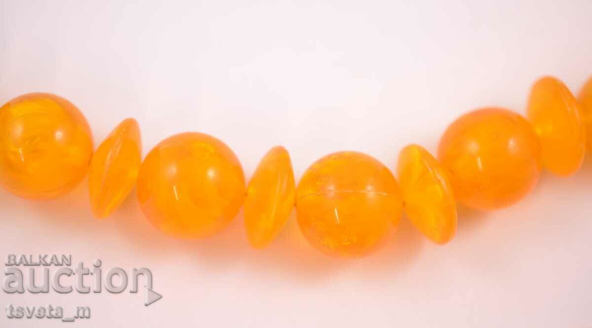 Women's amber type necklace with price 8.00 BGN | € 4.09 Women's amber type necklace with price 8.00 BGN | € 4.09