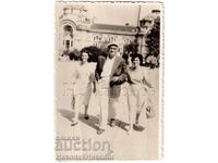 OLD PHOTO OF SOFIA WALKING IN FRONT OF THE BATHROOM D136