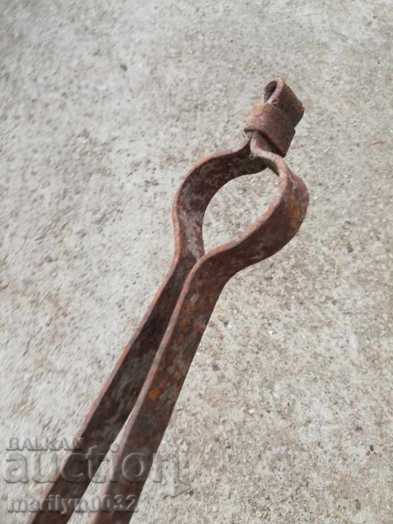 Auction Old hand-forged dilaf, wrought iron, tongs Auction Old hand-forged dilaf, wrought iron, tongs