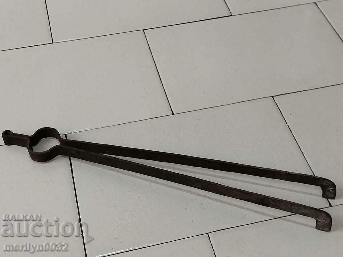 Old hand-forged dilaf, wrought iron, tongs