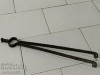 Old hand-forged dilaf, wrought iron, tongs