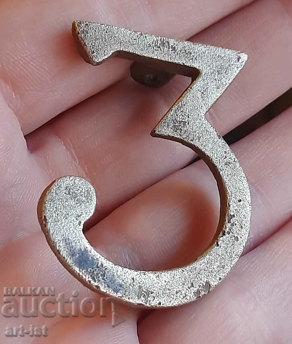 Delivery of Antique bronze regimental badge.