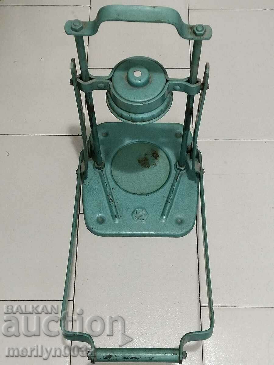 Delivery of An old machine, a machine for closing jars, the 70s of the 20th century Delivery of An old machine, a machine for closing jars, the 70s of the 20th century