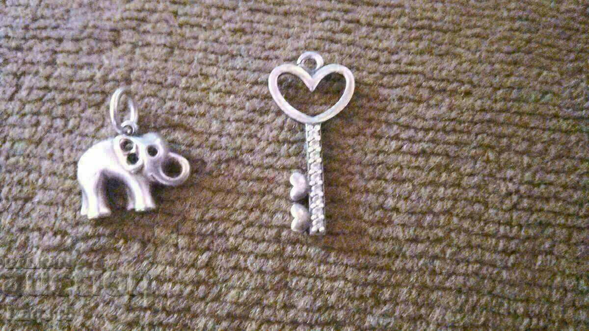 LOT OF TWO SILVER ELEPHANT AND HEART KEY PENDANTS WITH STONES