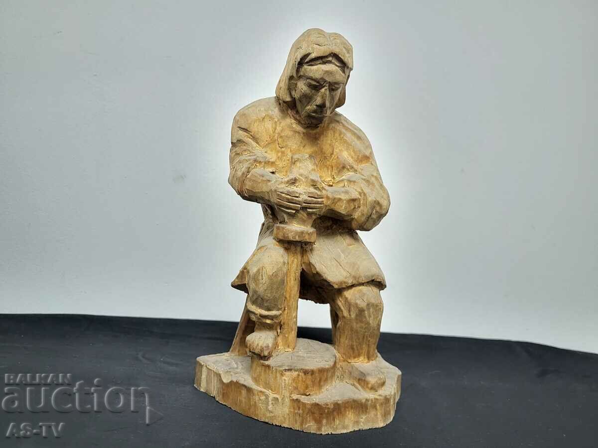 Wood carving "Potter"