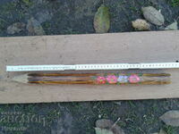 a large wooden pencil