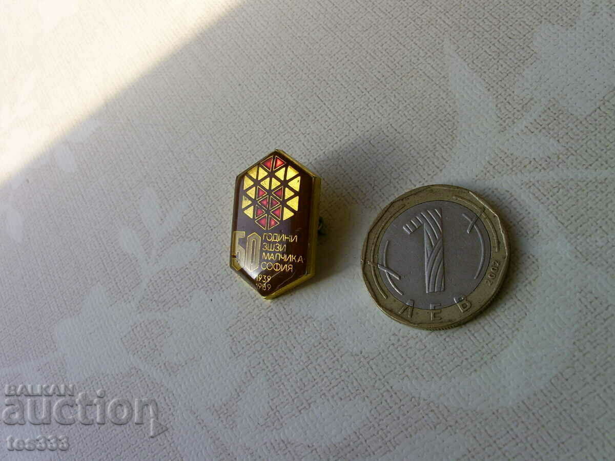 Значка 50 години ЗШЗИ Малчика София 1939-1989 с цена € 0.87 | 1.70 лв. Значка 50 години ЗШЗИ Малчика София 1939-1989 с цена € 0.87 | 1.70 лв.
