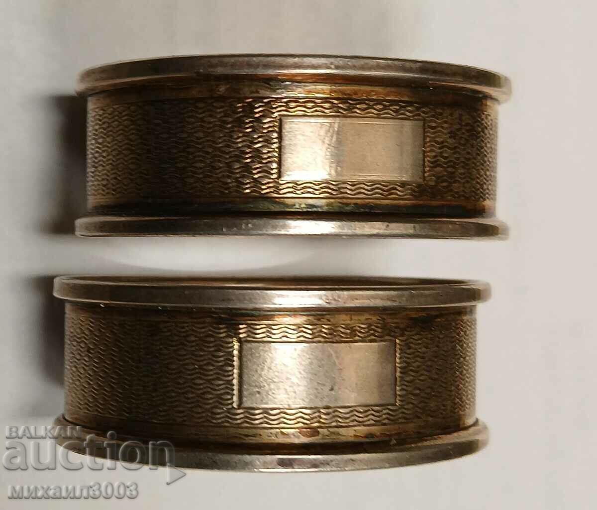 Auction A PAIR OF EARLY 20TH CENTURY SILVER NAPKINS Auction A PAIR OF EARLY 20TH CENTURY SILVER NAPKINS