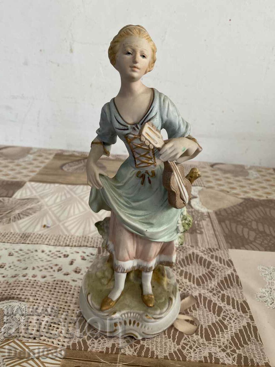 A beautiful old Russian biscuit porcelain figure