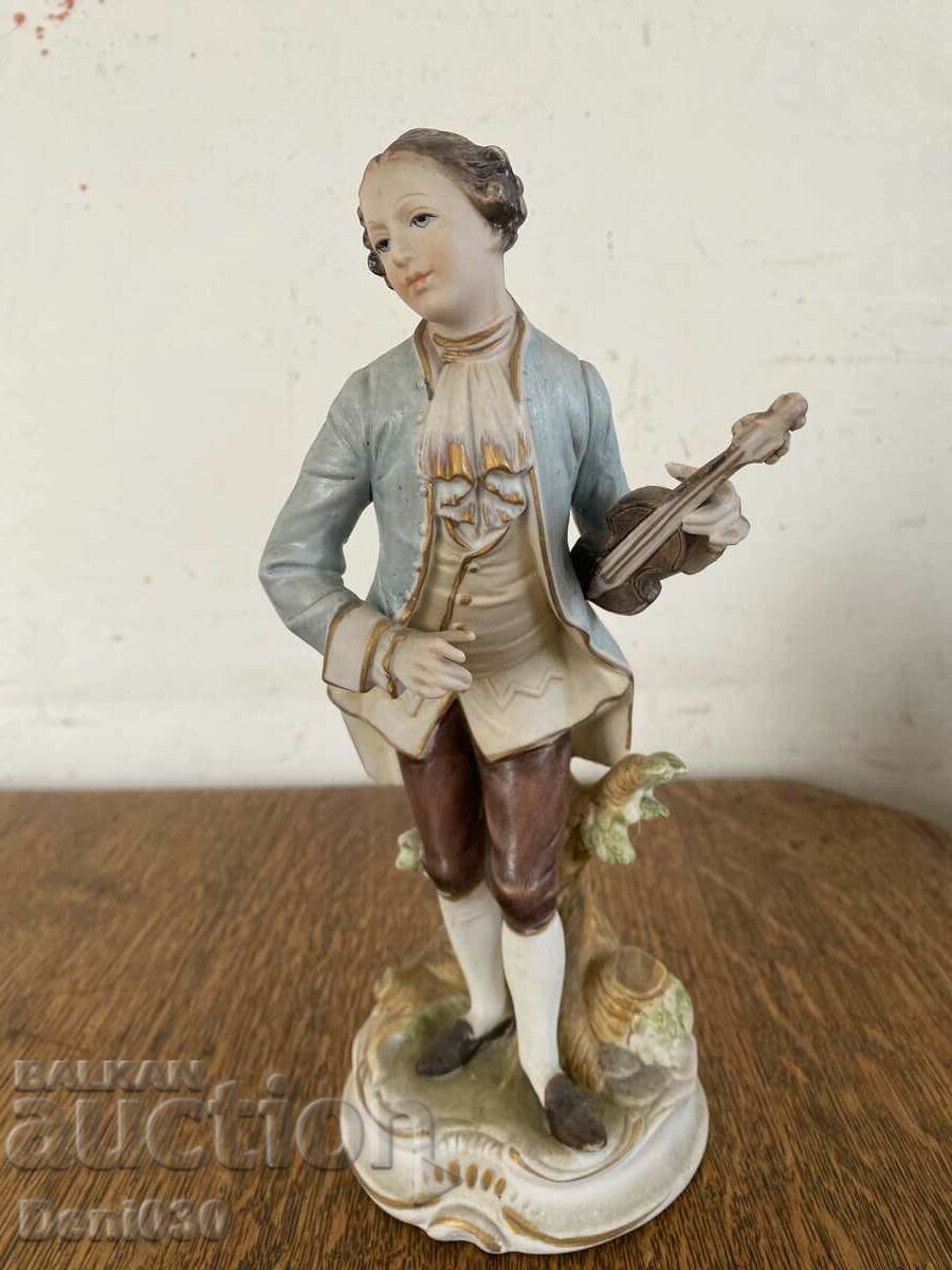 A beautiful biscuit porcelain figure