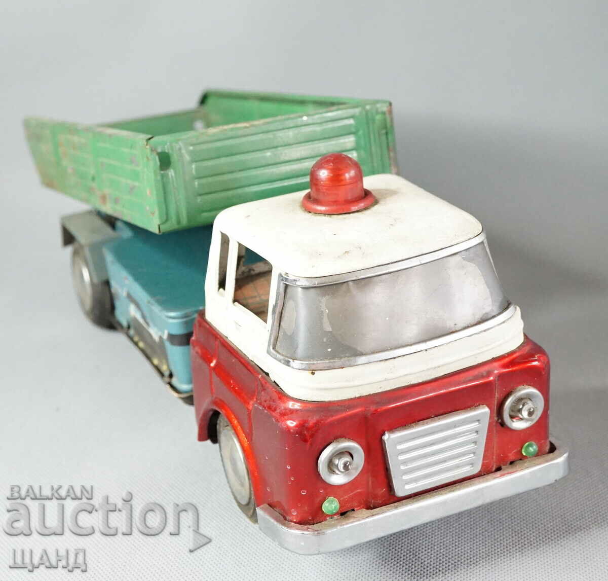 Old Chinese metal toy dump truck model