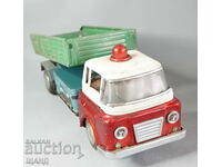 Old Chinese metal toy dump truck model