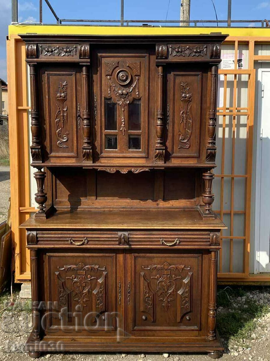 A unique massive cabinet with beautiful wood carving