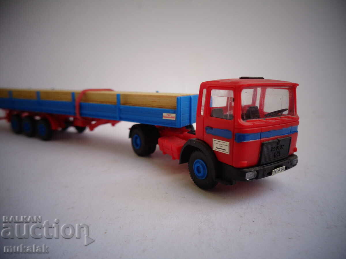Delivery of KIBRI H0 1/87 MAN TRUCK MODEL TOY TROLLEY WOODEN BEAMS Delivery of KIBRI H0 1/87 MAN TRUCK MODEL TOY TROLLEY WOODEN BEAMS