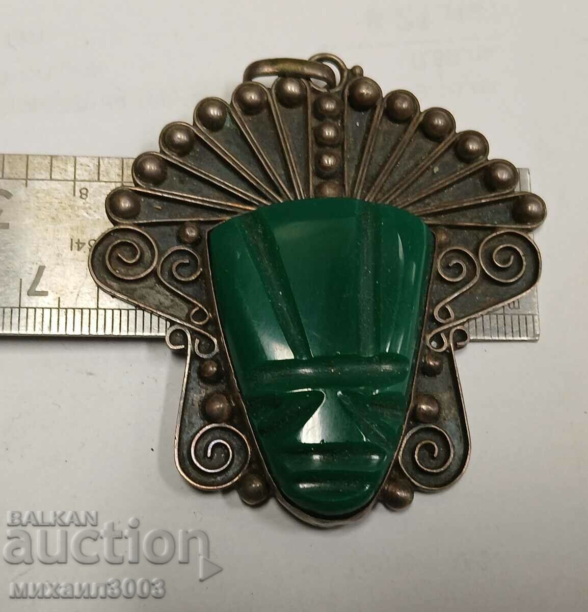 Delivery of Exotic silver locket with malachite