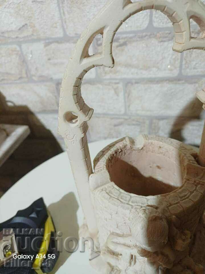 Auction Ashtray in the shape of a well Auction Ashtray in the shape of a well